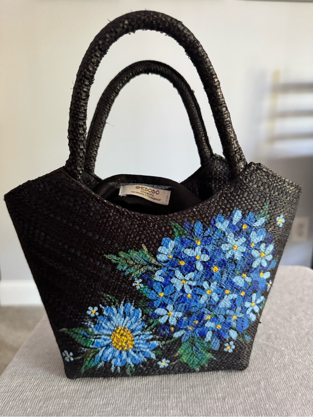 Shebobo Handmade Madagascar Black Raffia Tote – Hand-Painted Blue Floral